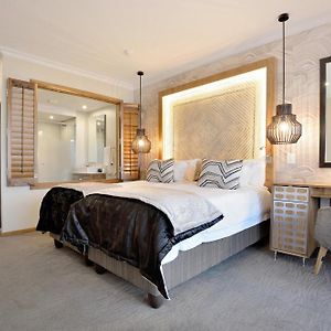 Kamer met Twee Aparte Bedden de Toegang voor Gehandicapten